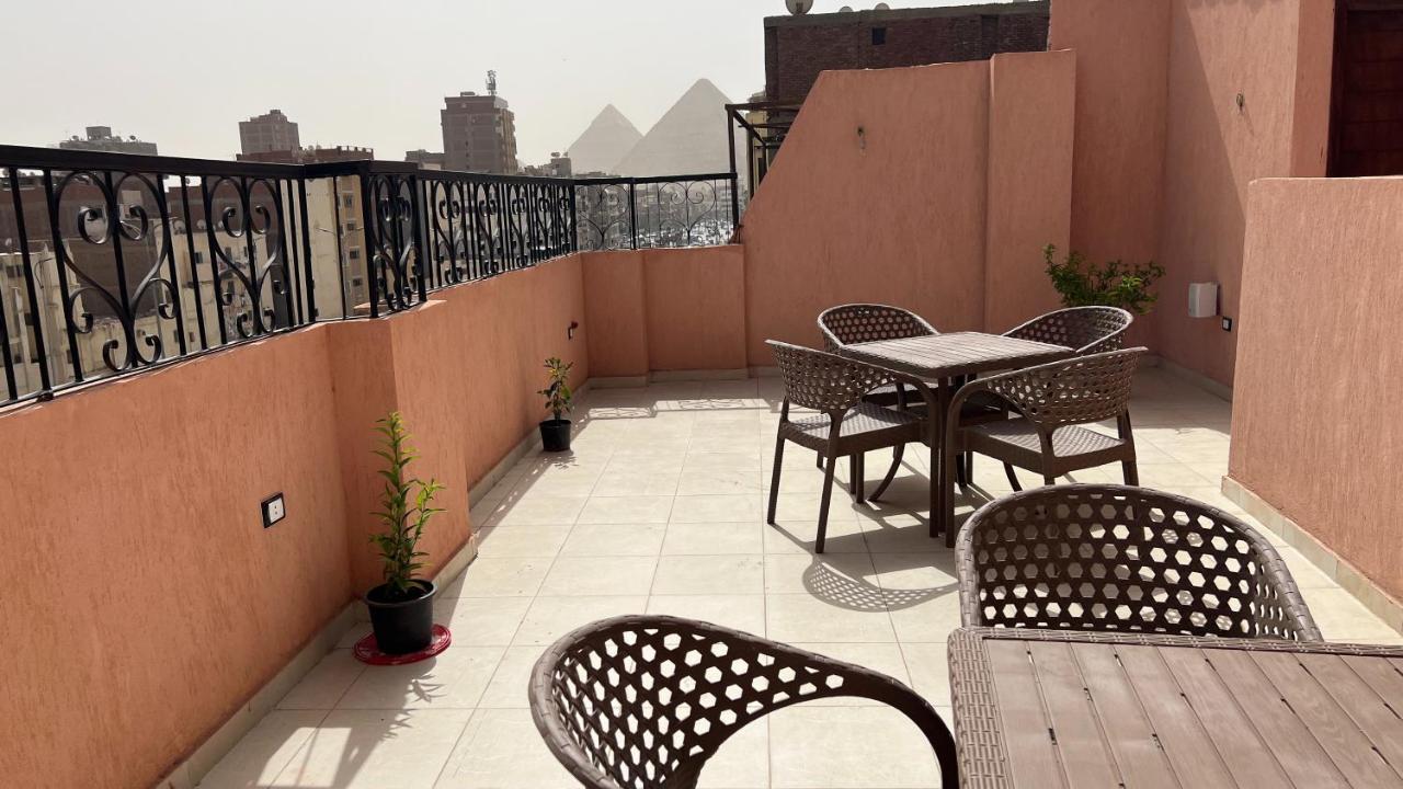 Pyramids Road Guest House Cozy Rooms And Rooftop Breakfast With The Pyramids View Nazlet el-Sîsi Εξωτερικό φωτογραφία
